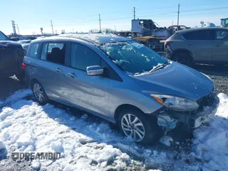 2014 Mazda 5 Sport with VIN JM1CW2BLXE0168119, listed as a IAAI auction lot 41527688 with 142,357 mi miles and . Bid and sale history available at DreamBid. Image 1.