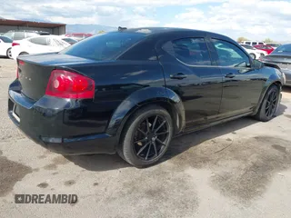 2014 Dodge Avenger SE z VIN 1C3CDZAGXEN130092, wystawiony jako IAAI lot #42216767 z przebiegiem 131 177 mil mil oraz . Historia ofert i sprzedaży dostępna na DreamBid. Obrazek 4.