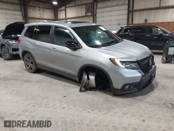 2021 Honda Passport EX-L with VIN 5FNYF8H56MB000107, listed as a IAAI auction lot 41868429 with 66,572 mi miles and . Bid and sale history available at DreamBid. Image 1.
