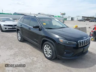 2019 Jeep Cherokee Latitude with VIN 1C4PJLCBXKD284954, listed as a IAAI auction lot 41877944 with 134,931 mi miles. Bid and sale history available at carsss.com. Image 1.