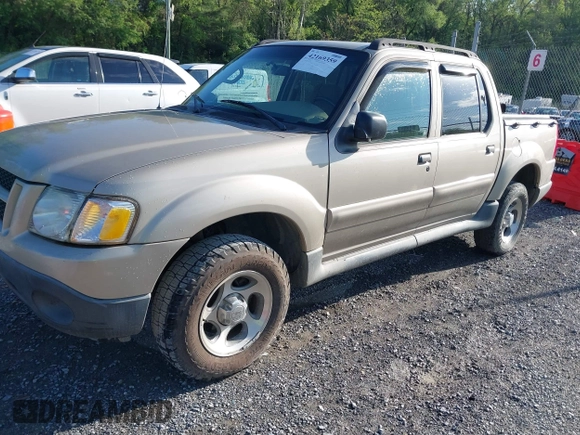 2004 Ford Explorer Sport Trac XLS z VIN 1FMZU77K84UA47217, wystawiony jako IAAI lot #42169359 z przebiegiem 169 053 mil mil oraz . Historia ofert i sprzedaży dostępna na DreamBid. Obrazek 2.