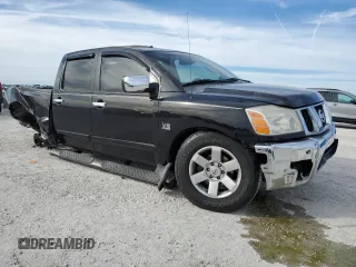 2004 Nissan Titan LE with VIN 1N6AA07A74N516071, listed as a Copart auction lot 87472284 with 140,011 mi miles and Salvage Title. Bid and sale history available at DreamBid. Image 4.