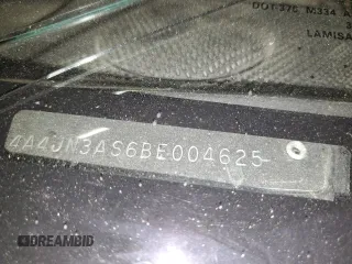2011 Mitsubishi Endeavor SE z VIN 4A4JN3AS6BE004625, wystawiony jako Copart lot #47873825 z przebiegiem 121 300 mil mil oraz Szkoda całkowita • Salvage title. Historia ofert i sprzedaży dostępna na DreamBid. Obrazek 14.