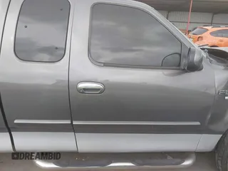 2003 Ford F-150 XL with VIN 1FTRX17W93NB63496, listed as a IAAI auction lot 42406687 with Not provided miles and . Bid and sale history available at DreamBid. Image 12.