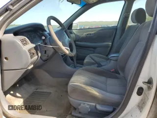 1999 Toyota Camry LE z VIN 4T1BG22K7XU440181, wystawiony jako Copart lot #59304385 z przebiegiem 113 864 mil mil oraz Czysty tytuł • Clean title. Historia ofert i sprzedaży dostępna na DreamBid. Obrazek 7.