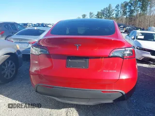 2023 Tesla Model Y Long Range with VIN 7SAYGDEE0PA202150, listed as a IAAI auction lot 41735258 with 22,131 mi miles and . Bid and sale history available at DreamBid. Image 16.