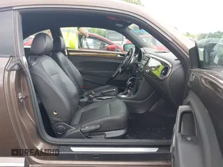 2012 Volkswagen Beetle 2.5L PZEV with VIN 3VWJP7AT2CM638265, listed as a IAAI auction lot 42512449 with 137,129 mi miles and . Bid and sale history available at DreamBid. Image 5.