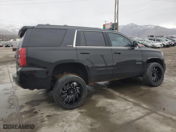 2019 Chevrolet Tahoe LT with VIN 1GNSKBKC7KR306530, listed as a Copart auction lot 42024765 with 122,249 mi miles and Salvage Title. Bid and sale history available at carsss.com. Image 3.
