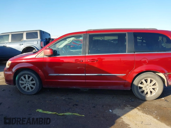 2013 Chrysler Town & Country Touring with VIN 2C4RC1BG2DR758951, listed as a IAAI auction lot 41136184 with 134,784 mi miles. Bid and sale history available at carsss.com. Image 14.