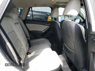 2016 Mazda CX-5 Grand Touring with VIN JM3KE4DY3G0688286, listed as a Copart auction lot 52182205 with 194,352 mi miles and Salvage Title. Bid and sale history available at DreamBid. Image 11.