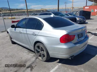 2011 BMW 3 Series 328i with VIN WBAPH5G51BNM77903, listed as a IAAI auction lot 42001088 with 126,012 mi miles and . Bid and sale history available at DreamBid. Image 3.