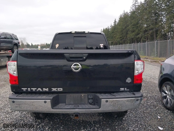 2016 Nissan Titan XD Platinum Reserve with VIN 1N6BA1F2XGN502660, listed as a IAAI auction lot 41731577 with 118,581 mi miles. Bid and sale history available at carsss.com. Image 16.