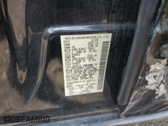 2007 Nissan Frontier SE with VIN 1N6AD09W47C428451, listed as a Copart auction lot 61809095 with 101,969 mi miles and Salvage title. Bid and sale history available at DreamBid. Image 12.