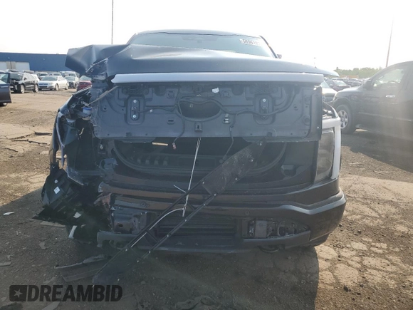 2024 Ford F-150 Lightning Flash with VIN 1FT6W3L75RWG27385, listed as a Copart auction lot 58961275 with 6,010 mi miles and Clean title. Bid and sale history available at DreamBid. Image 5.