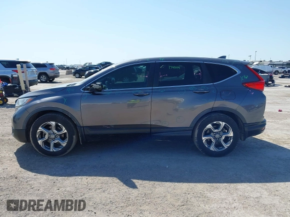2019 Honda CR-V EX with VIN 5J6RW1H58KA042502, listed as a IAAI auction lot 42001700 with 117,396 mi miles and . Bid and sale history available at DreamBid. Image 14.