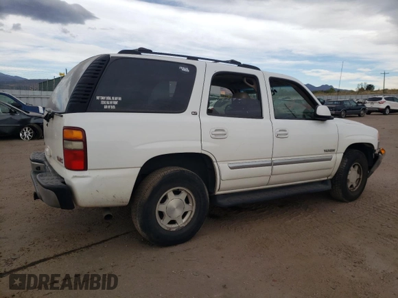 2003 GMC Yukon SLE with VIN 1GKEK13T43R205384, listed as a Copart auction lot 76916664 with 258,551 mi miles and Salvage Title. Bid and sale history available at carsss.com. Image 3.