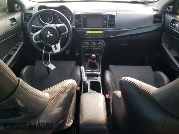 2015 Mitsubishi Lancer Evolution Final Edition z VIN JA32W7FV7FU608214, wystawiony jako Copart lot #68316174 z przebiegiem 56 714 mil mil oraz Szkody całkowita. Historia ofert i sprzedaży dostępna na DreamBid. Obrazek 8.