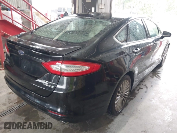 2013 Ford Fusion Titanium Hybrid with VIN 3FA6P0RU4DR281789, listed as a IAAI auction lot 41909115 with 161,008 mi miles and . Bid and sale history available at DreamBid. Image 4.