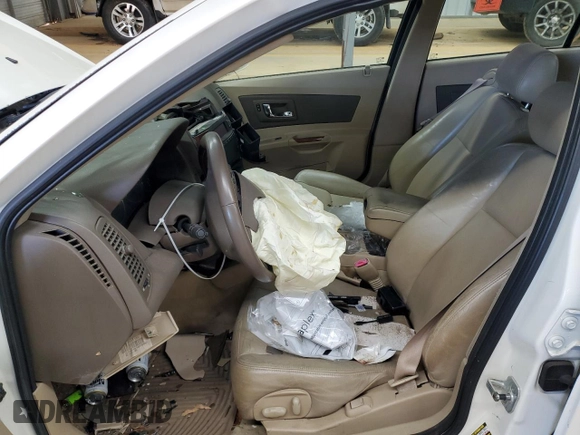 2006 Cadillac CTS z VIN 1G6DP577660112875, wystawiony jako Copart lot #87670565 z przebiegiem Nie podano mil oraz Szkoda całkowita • Salvage title. Historia ofert i sprzedaży dostępna na DreamBid. Obrazek 7.