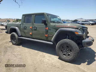 2023 Jeep Gladiator Mojave with VIN 1C6JJTEG9PL559331, listed as a Copart auction lot 62415345 with 22,091 mi miles and Salvage title. Bid and sale history available at DreamBid. Image 4.