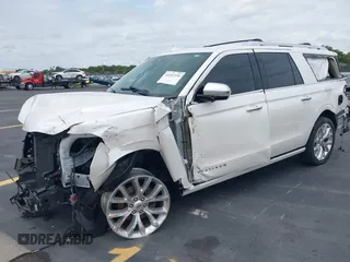 2019 Ford Expedition Max Platinum with VIN 1FMJK1LT3KEA56753, listed as a IAAI auction lot 42247331 with 73,909 mi miles and . Bid and sale history available at DreamBid. Image 2.