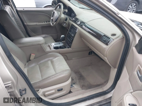 2005 Mercury Montego Luxury z VIN 1MEFM40185G611793, wystawiony jako IAAI lot #41125667 z przebiegiem Nie podano mil oraz . Historia ofert i sprzedaży dostępna na DreamBid. Obrazek 5.