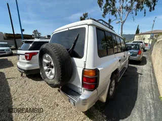 2000 Mitsubishi Montero z VIN JA4MR51R6YJ002305, wystawiony jako Copart lot #50263015 z przebiegiem 138 861 mil mil oraz Czysty tytuł • Clean title. Historia ofert i sprzedaży dostępna na DreamBid. Obrazek 4.
