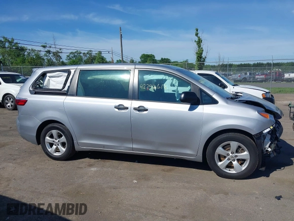 2015 Toyota Sienna L with VIN 5TDZK3DCXFS594786, listed as a IAAI auction lot 42292618 with 180,119 mi miles and . Bid and sale history available at DreamBid. Image 13.