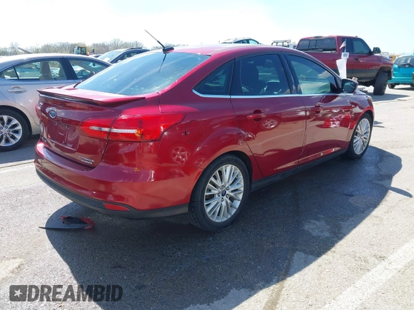 2015 Ford Focus Titanium with VIN 1FADP3J29FL230664, listed as a IAAI auction lot 41870083 with 125,578 mi miles and . Bid and sale history available at DreamBid. Image 4.