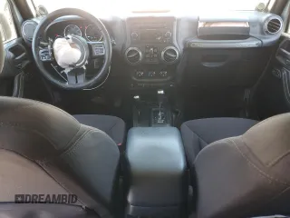 2014 Jeep Wrangler Unlimited Sport with VIN 1C4HJWDG1EL221302, listed as a Copart auction lot 63331015 with 213,912 mi miles and Salvage title. Bid and sale history available at DreamBid. Image 8.