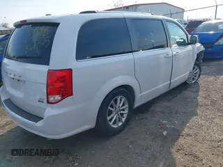2019 Dodge Grand Caravan SXT with VIN 2C4RDGCG5KR758521, listed as a IAAI auction lot 41902760 with 133,994 mi miles and . Bid and sale history available at DreamBid. Image 4.
