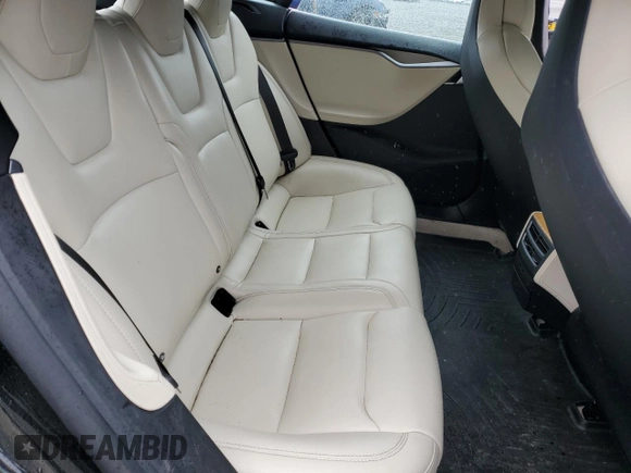2019 Tesla Model S 75D with VIN 5YJSA1E28KF349241, listed as a Copart auction lot 55279595 with 77,005 mi miles and Salvage title. Bid and sale history available at DreamBid. Image 10.
