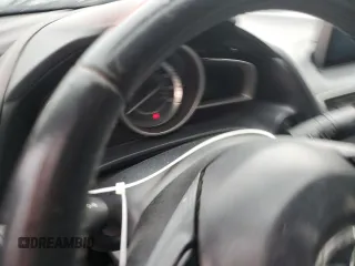 2015 Mazda 3 i Grand Touring с VIN 3MZBM1W74FM194669, выставлен на аукционе Copart как лот 61599235 с пробегом Не указан миль и Чистый • Clean title. История ставок и продаж доступна на DreamBid. Изображение 9.