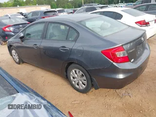 2012 Honda Civic LX z VIN 2HGFB2F59CH316498, wystawiony jako IAAI lot #42179887 z przebiegiem 218 009 mil mil oraz . Historia ofert i sprzedaży dostępna na DreamBid. Obrazek 3.