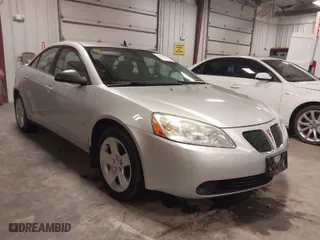 2009 Pontiac G6 w/1SA *Ltd Avail* with VIN 1G2ZG57B094155004, listed as a IAAI auction lot 41925584 with 123,169 mi miles. Bid and sale history available at carsss.com. Image 1.