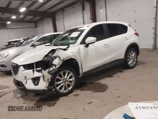 2014 Mazda CX-5 Grand Touring with VIN JM3KE4DY3E0374036, listed as a IAAI auction lot 41889030 with 162,611 mi miles and . Bid and sale history available at DreamBid. Image 17.