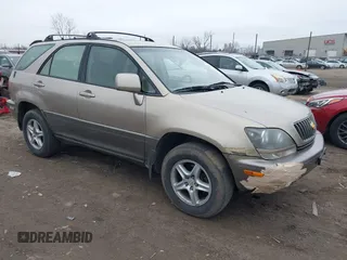 1999 Lexus RX 300 Luxury SUV with VIN JT6HF10U8X0027961, listed as a IAAI auction lot 41541961 with 246,095 mi miles. Bid and sale history available at carsss.com. Image 1.