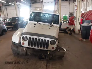 2012 Jeep Wrangler Arctic z VIN 1C4AJWBG9CL233232, wystawiony jako IAAI lot #42282805 z przebiegiem 109 927 mil mil oraz . Historia ofert i sprzedaży dostępna na DreamBid. Obrazek 12.