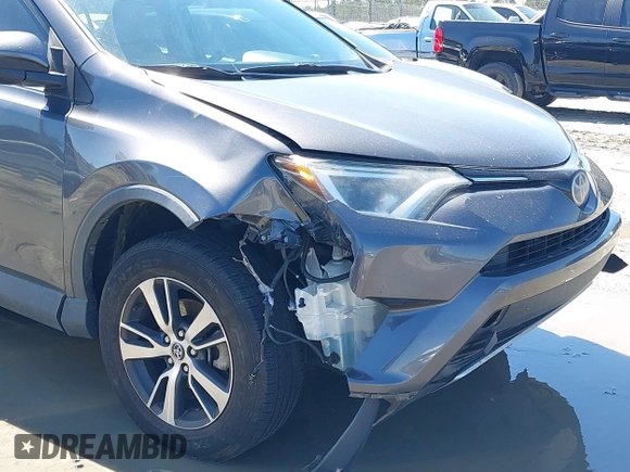 2018 Toyota RAV4 XLE with VIN 2T3WFREV9JW503136, listed as a IAAI auction lot 41815266 with 118,585 mi miles. Bid and sale history available at carsss.com. Image 6.