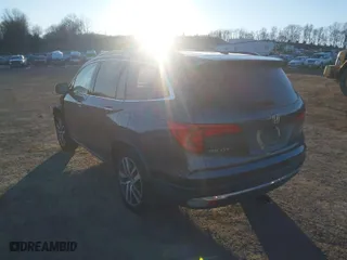 2017 Honda Pilot Touring with VIN 5FNYF6H94HB078642, listed as a IAAI auction lot 41621098 with 61,338 mi miles. Bid and sale history available at carsss.com. Image 3.