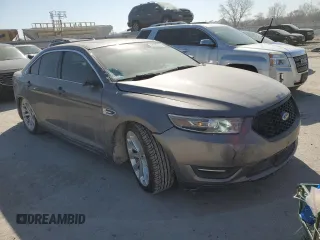 2014 Ford Taurus Limited z VIN 1FAHP2F88EG134315, wystawiony jako Copart lot #48550195 z przebiegiem 136 275 mil mil oraz Szkoda całkowita • Salvage title. Historia ofert i sprzedaży dostępna na DreamBid. Obrazek 4.