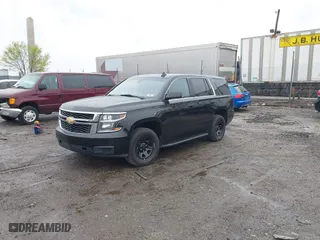 2015 Chevrolet Tahoe Commercial with VIN 1GNSK2EC8FR570602, listed as a IAAI auction lot 41977021 with 115,866 mi miles. Bid and sale history available at carsss.com. Image 17.