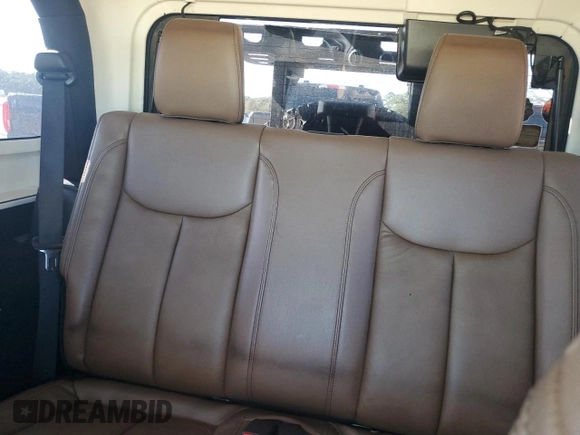 2013 Jeep Wrangler Rubicon with VIN 1C4BJWCG3DL590006, listed as a Copart auction lot 85855594 with 99,218 mi miles and Salvage title. Bid and sale history available at DreamBid. Image 10.