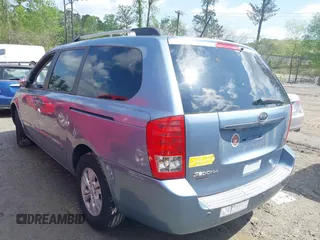 2011 Kia Sedona LX with VIN KNDMG4C7XB6394183, listed as a IAAI auction lot 41988292 with 246,557 mi miles. Bid and sale history available at carsss.com. Image 3.
