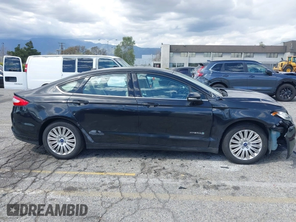 2015 Ford Fusion SE Hybrid with VIN 3FA6P0LU7FR199065, listed as a IAAI auction lot 41944181 with 197,020 mi miles. Bid and sale history available at carsss.com. Image 13.