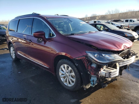 2017 Chrysler Pacifica Touring-L with VIN 2C4RC1BG9HR702303, listed as a Copart auction lot 82663374 with 182,648 mi miles and Salvage Title. Bid and sale history available at carsss.com. Image 4.