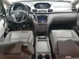 2014 Honda Odyssey Touring with VIN 5FNRL5H90EB014360, listed as a Copart auction lot 56699845 with 180,913 mi miles and Salvage title. Bid and sale history available at DreamBid. Image 8.