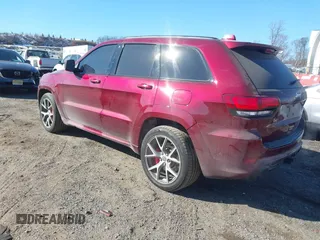 2017 Jeep Grand Cherokee SRT with VIN 1C4RJFDJ1HC754559, listed as a IAAI auction lot 41461029 with 100,096 mi miles. Bid and sale history available at carsss.com. Image 3.