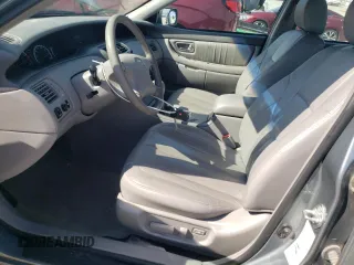 2001 Toyota Avalon XL z VIN 4T1BF28B51U184110, wystawiony jako Copart lot #52398285 z przebiegiem 127 179 mil mil oraz Szkoda całkowita • Salvage title. Historia ofert i sprzedaży dostępna na DreamBid. Obrazek 7.