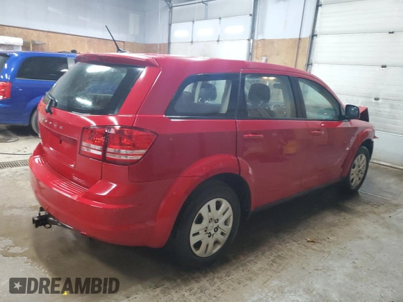 2013 Dodge Journey American Value with VIN 3C4PDCAB4DT729714, listed as a Copart auction lot 75707464 with 81,346 mi miles and Salvage Title. Bid and sale history available at DreamBid. Image 3.